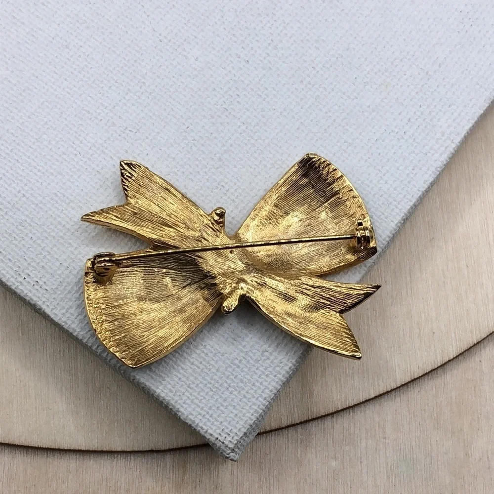 Vintage enamel fancy  bow brooch, textured look